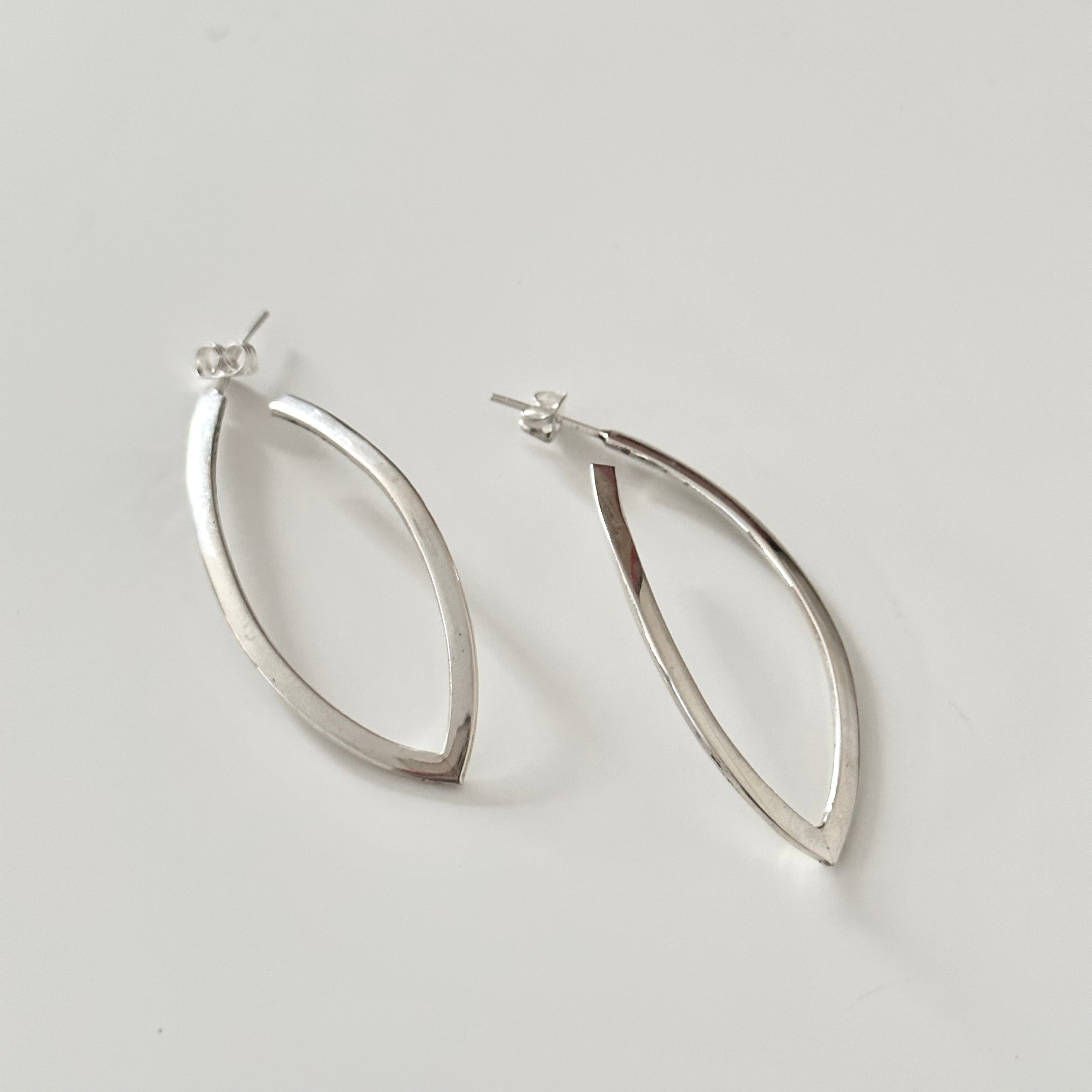 Curved Sterling Silver Hoops in a Leaf Like Shape